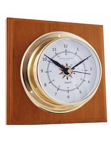 BRASS CLOCK ON WOODEN BOARD